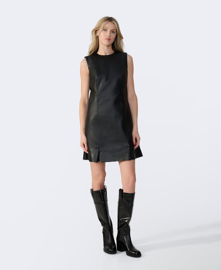 Sleeveless black leather dress on model