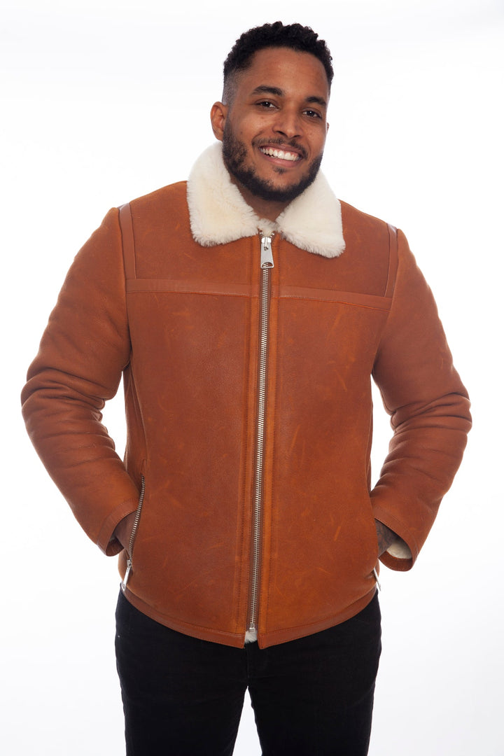 Man wearing brown shearling jacket