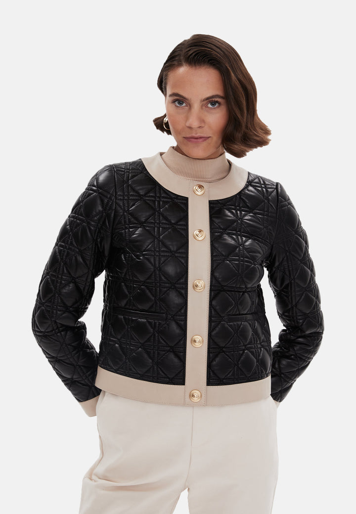 Black quilted leather jacket with beige trim