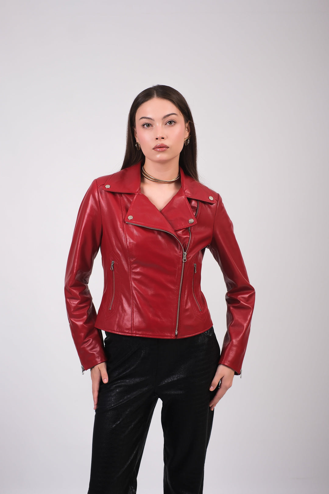 Woman wearing red leather biker jacket