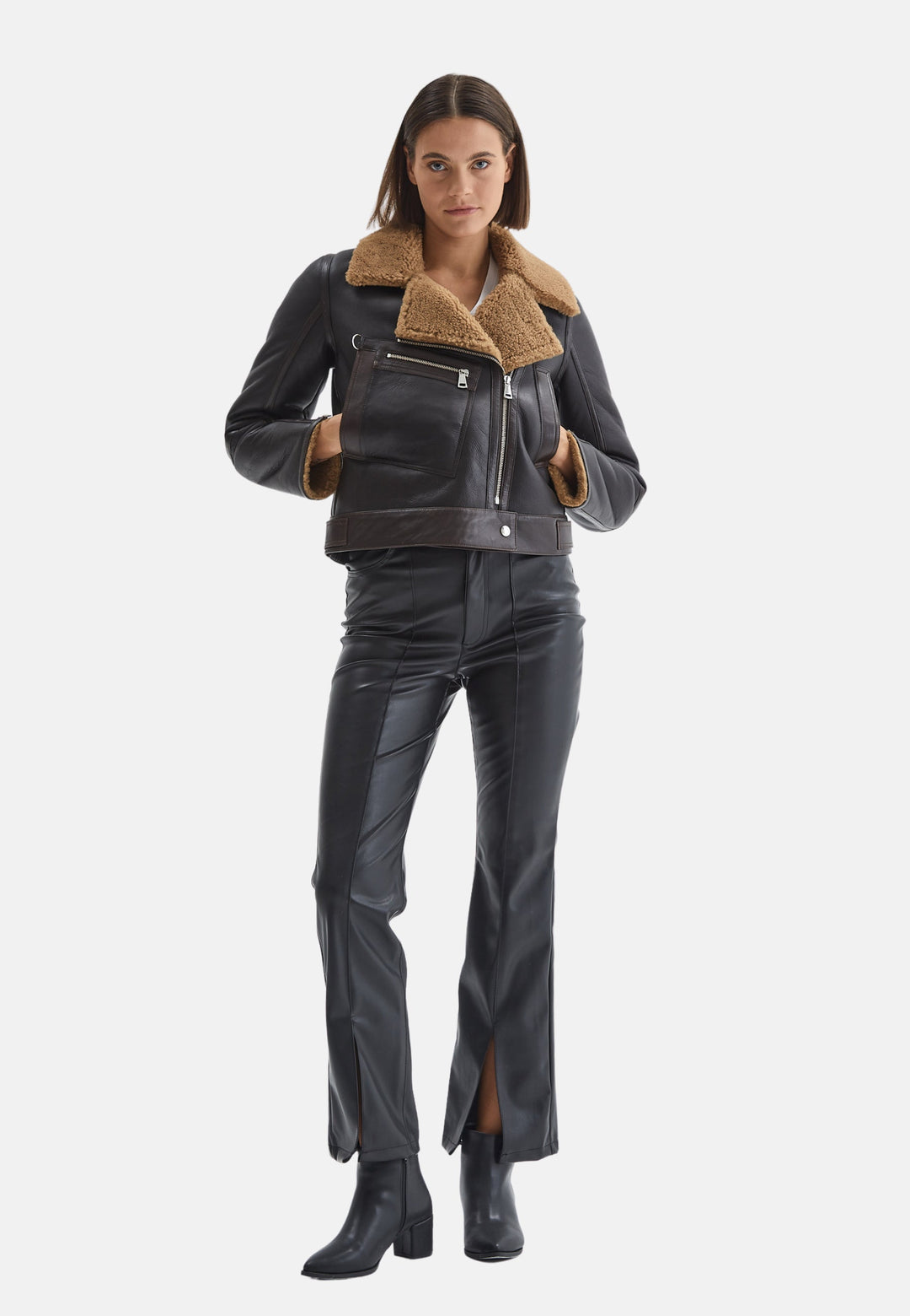 Woman wearing black shearling-lined jacket