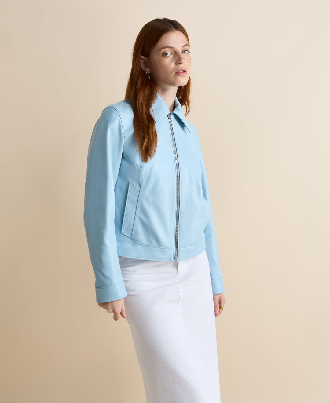 Light blue leather jacket on model