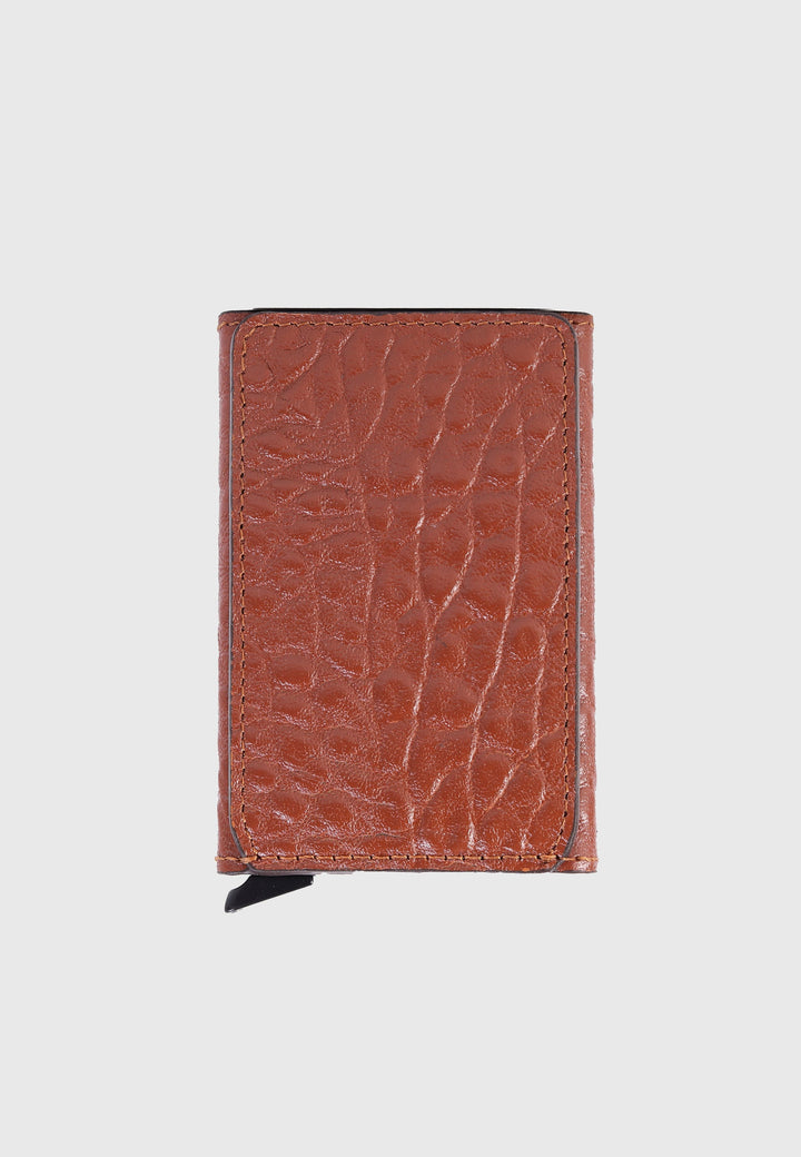 Tan leather elephant-pattern card holder