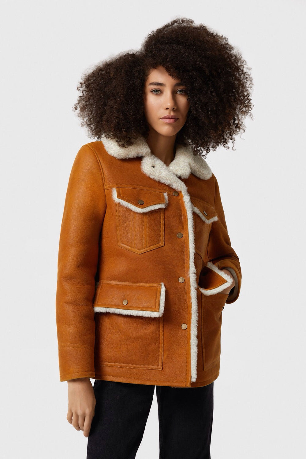 Cognac shearling coat on model