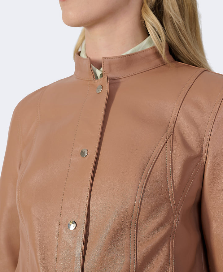 Tan leather jacket close-up on model