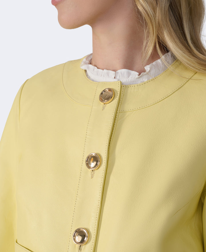 Yellow leather jacket with gold buttons