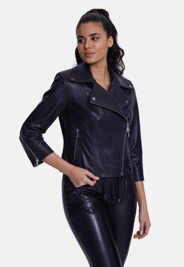 Woman wearing black leather jacket
