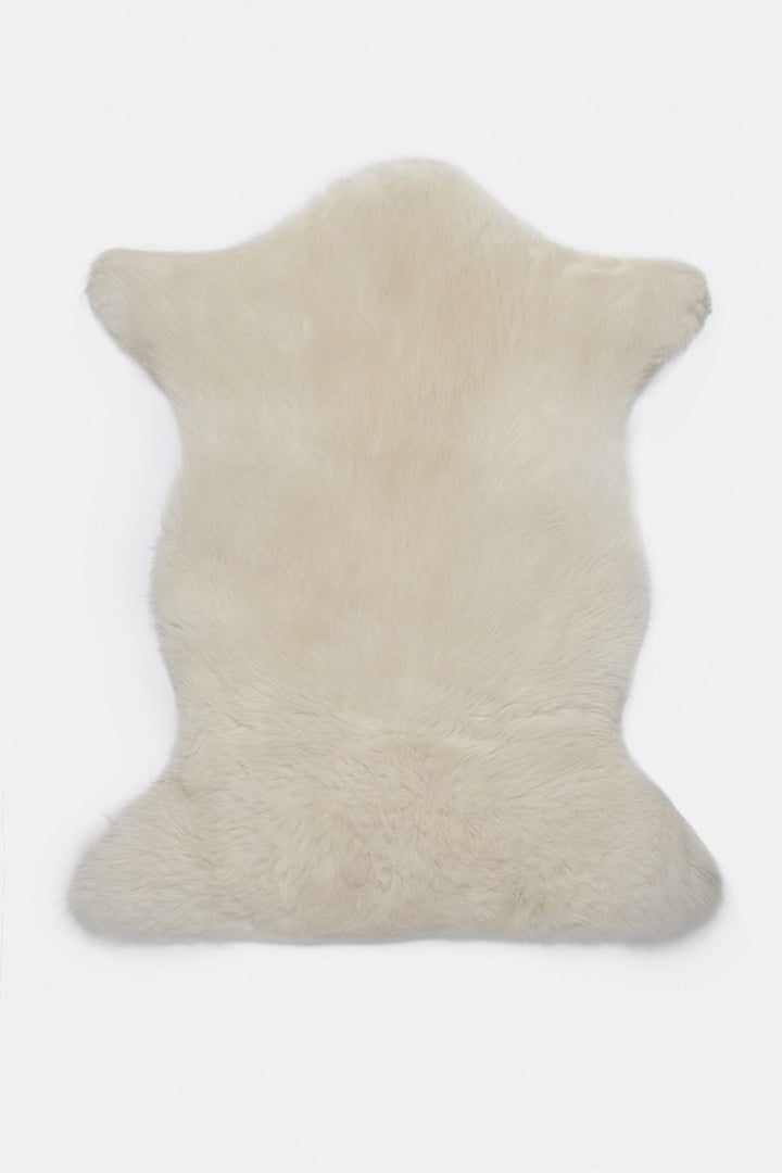 Natural white sheepskin rug