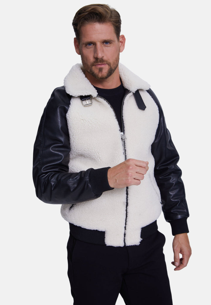 Man wearing white shearling jacket