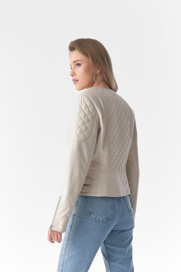 Beige quilted leather jacket on model