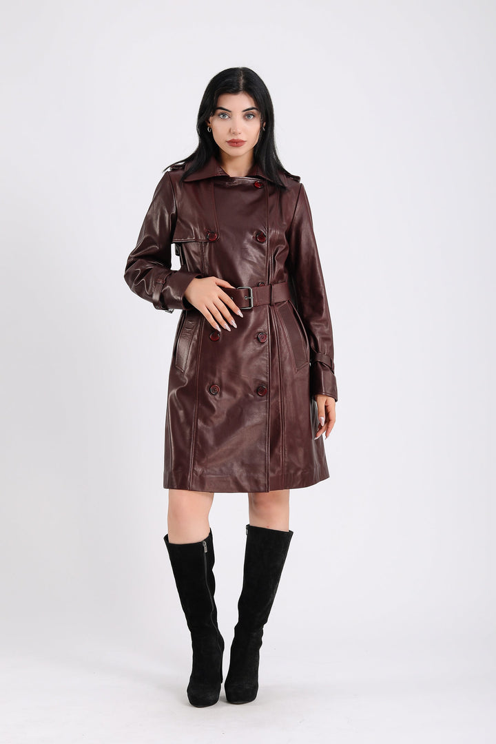 Woman wearing brown leather trench coat