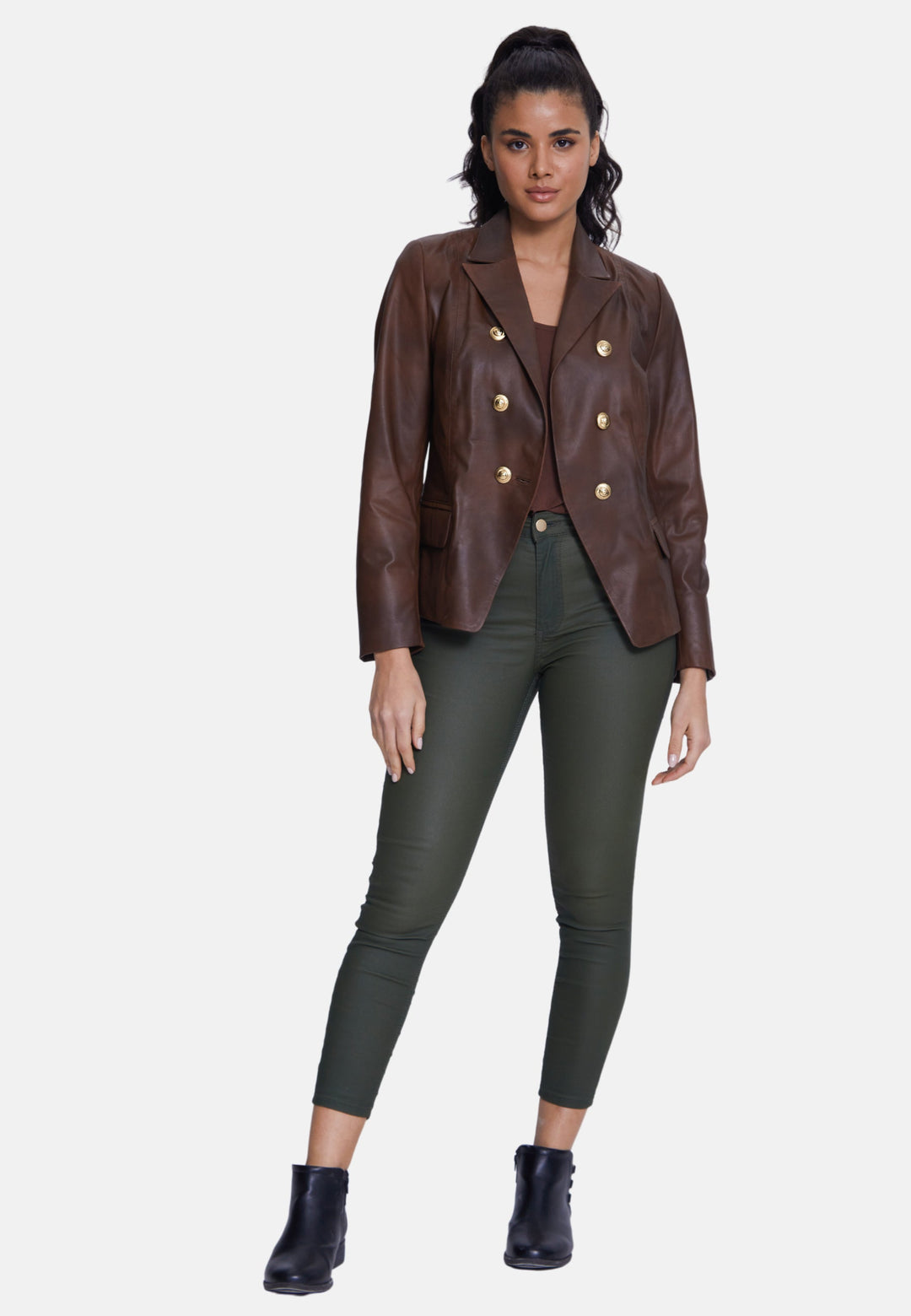 Woman wearing brown leather double-breasted blazer