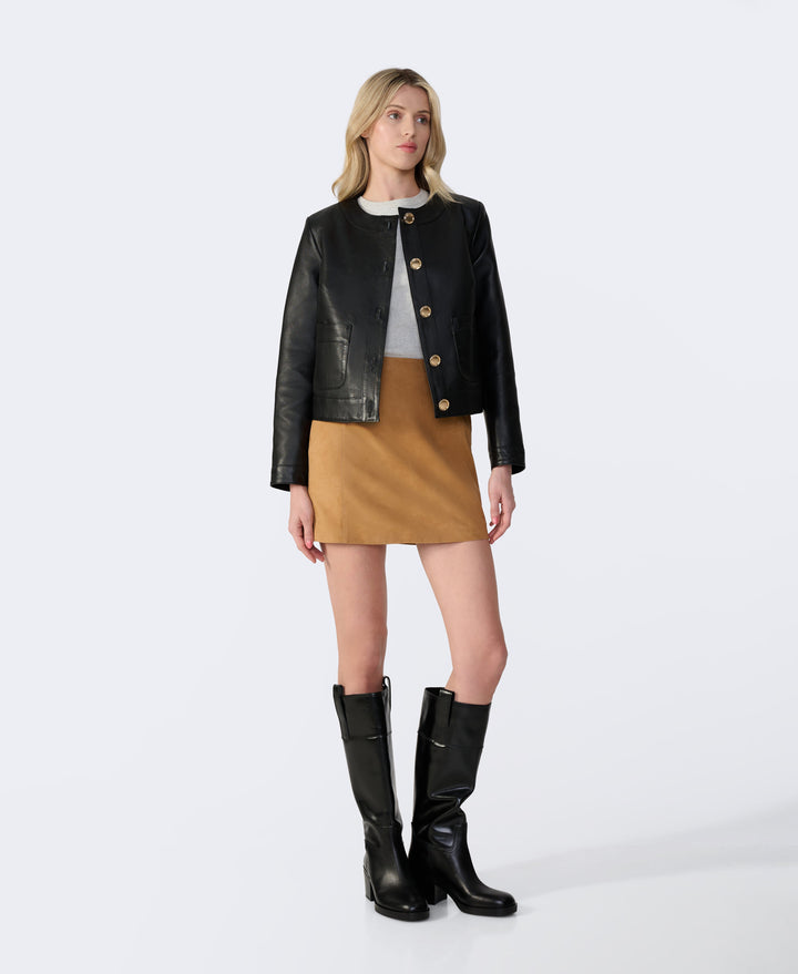 Woman wearing black leather jacket