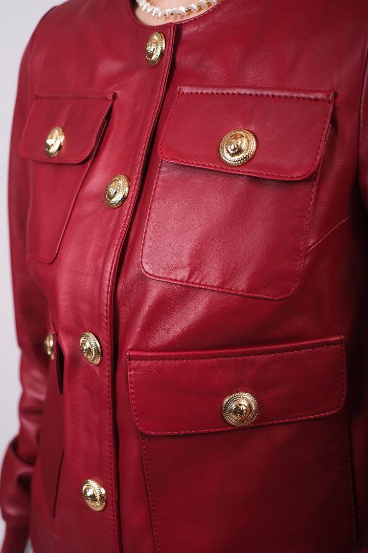 Red leather jacket with gold buttons