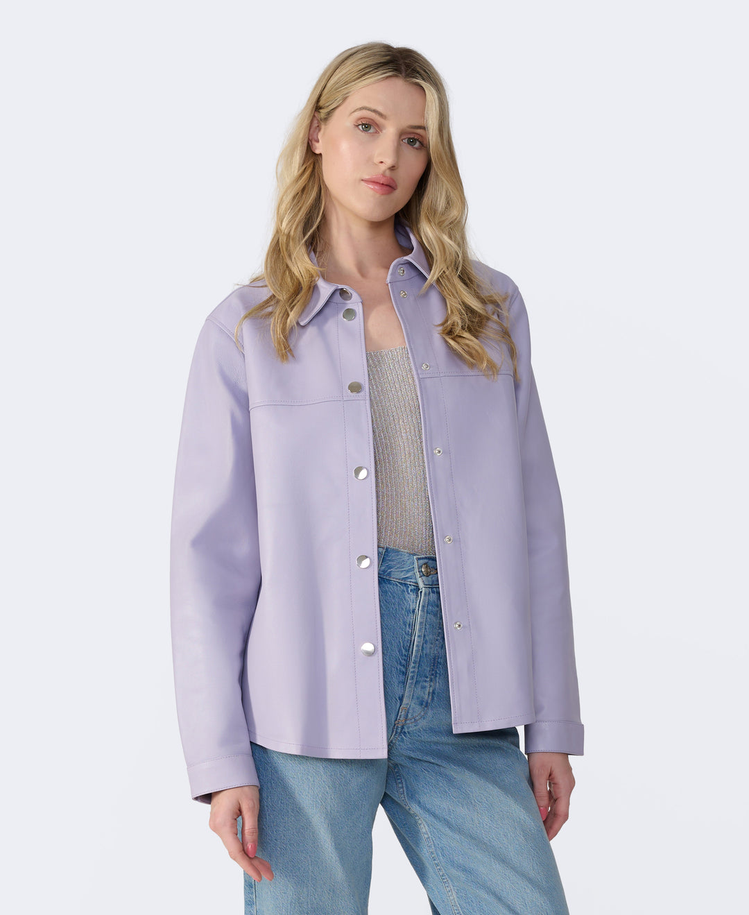 Woman wearing lilac leather shirt jacket