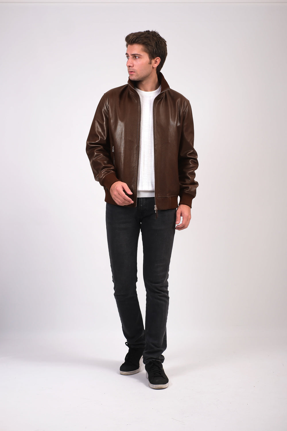 Man wearing brown leather jacket