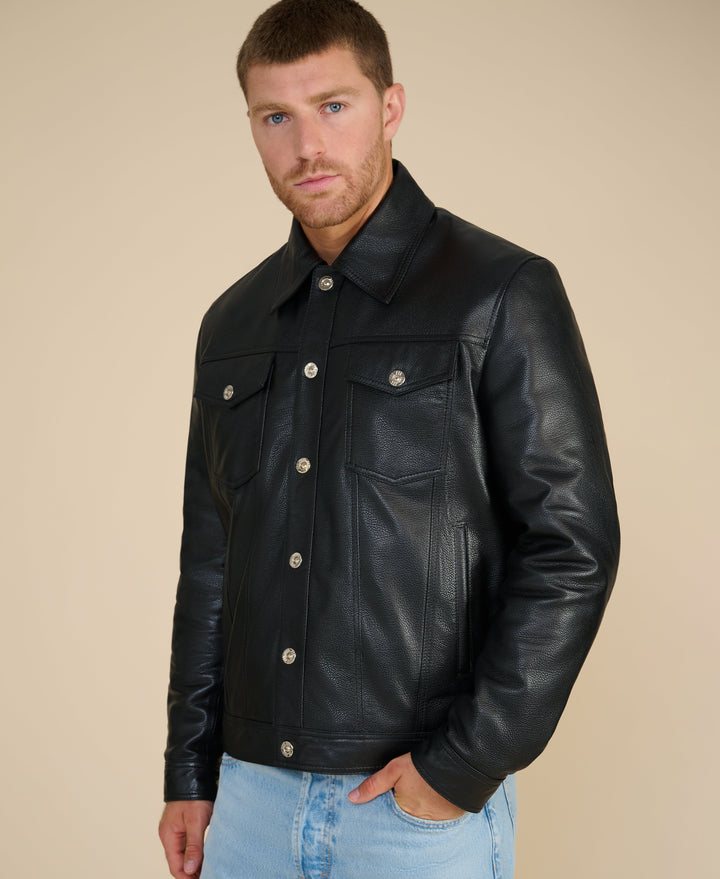 Man wearing black leather jacket