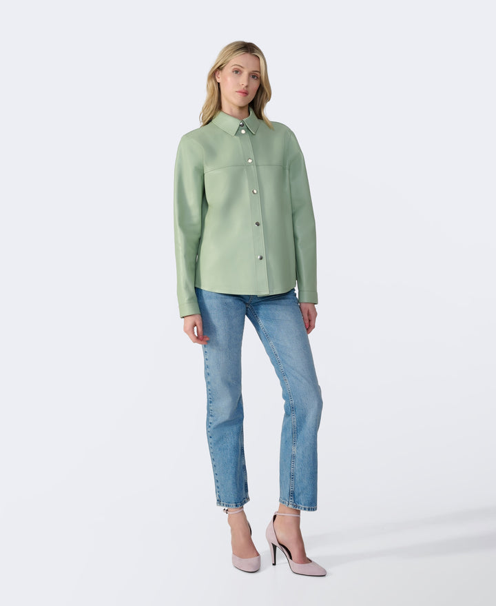 Sage leather shirt jacket on model