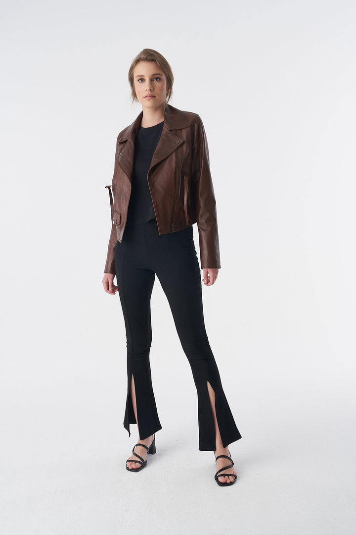 Woman wearing brown leather jacket