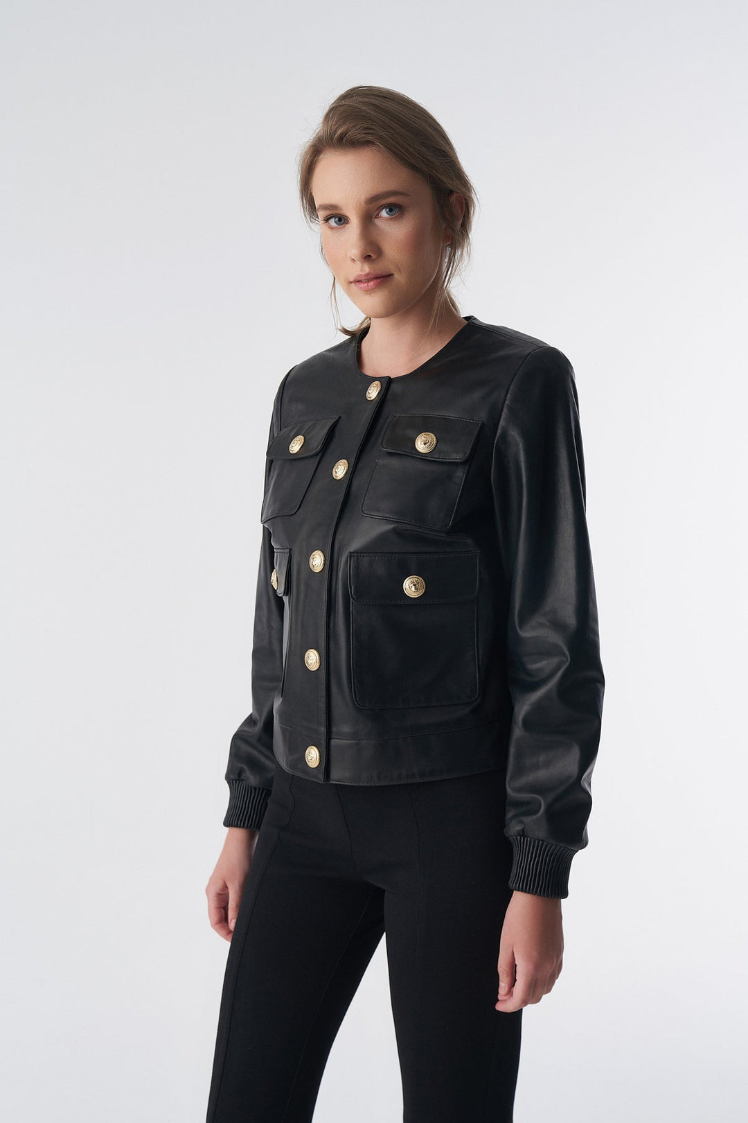 Black leather jacket with gold buttons