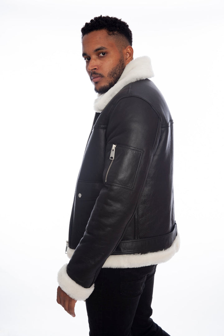 Man wearing black shearling jacket
