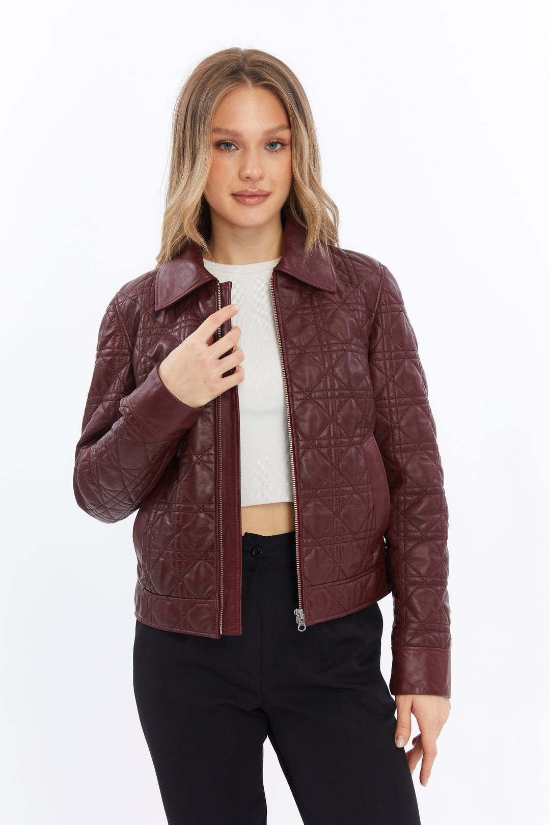 Woman wearing burgundy quilted leather jacket