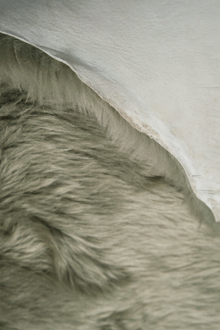 Light green sheepskin rug close-up