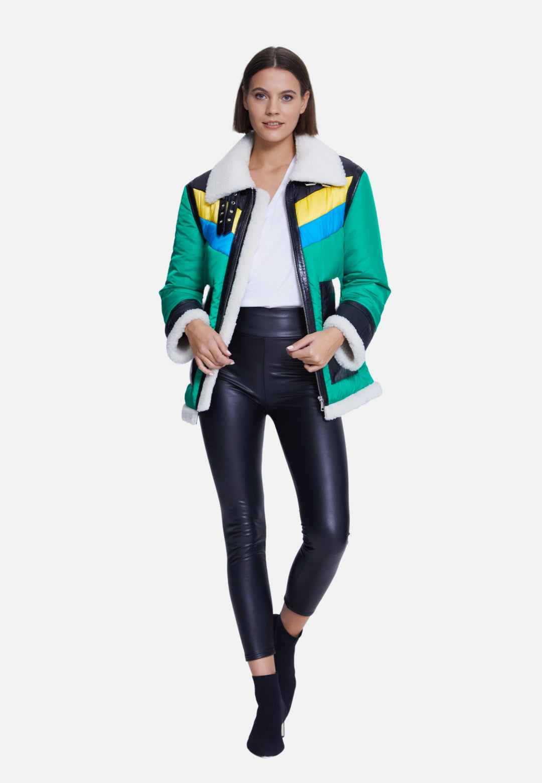 Woman wearing green color-block sheepskin coat