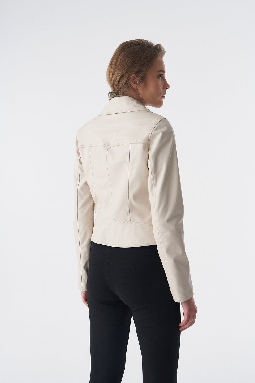 Beige leather jacket on model (back)