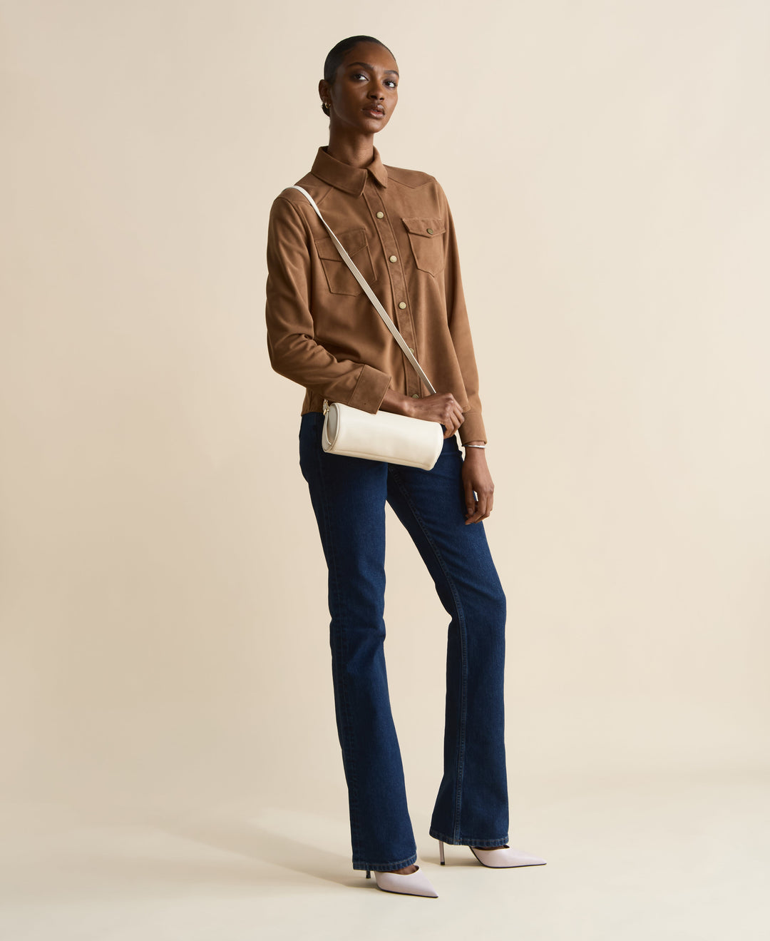 Beige leather crossbody handbag