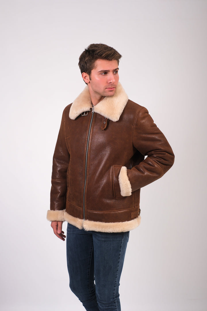 Brown shearling aviator jacket on model