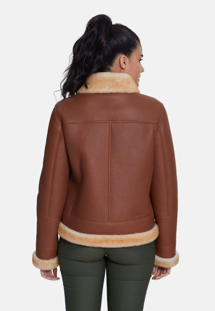 Woman wearing brown sheepskin jacket