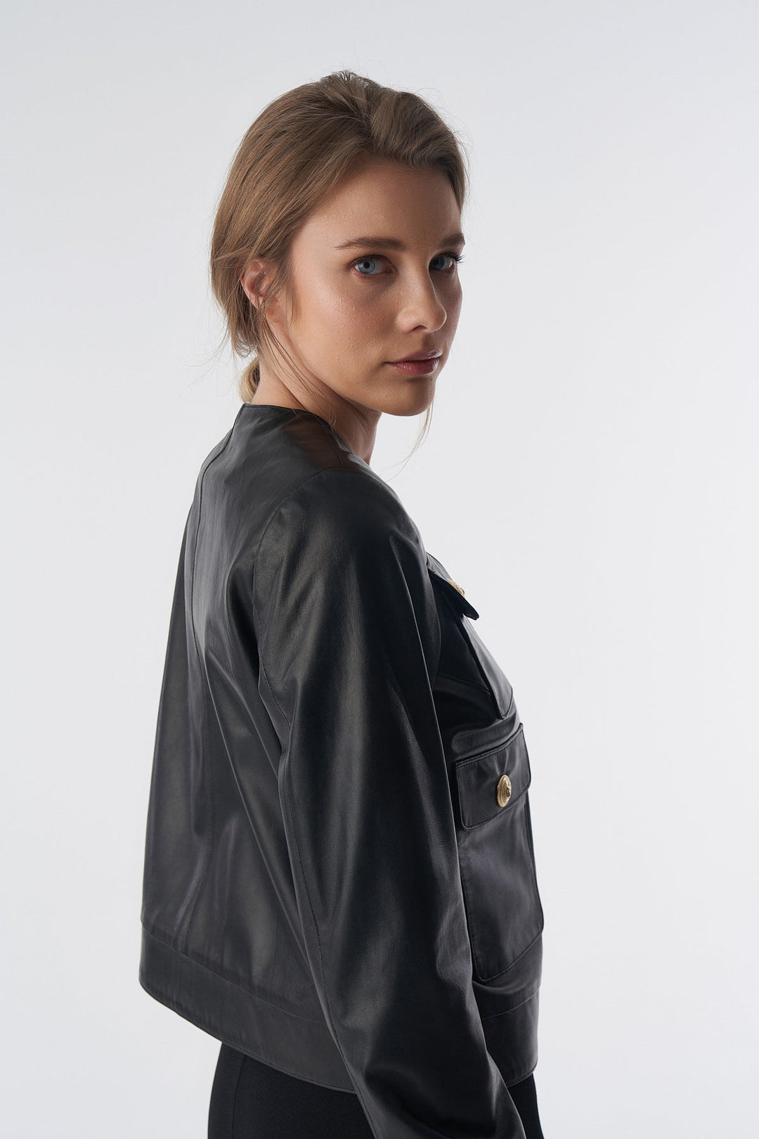 Woman wearing black leather jacket