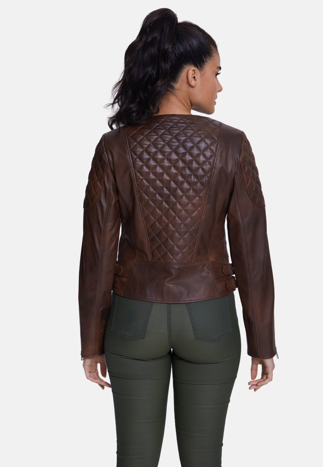 Woman wearing brown quilted-back leather jacket