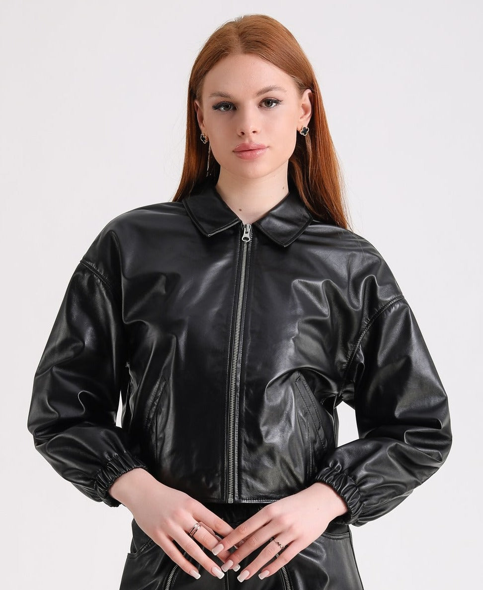 Woman wearing black leather jacket