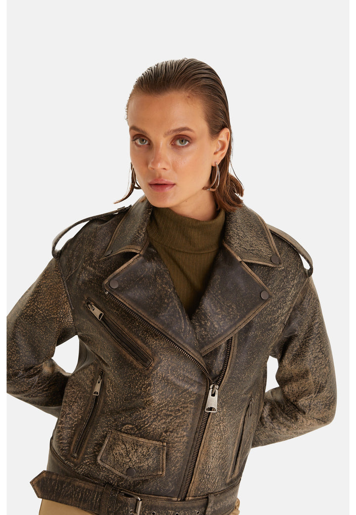 Woman wearing distressed brown leather jacket