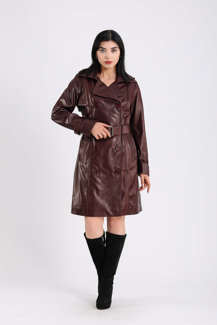 Woman wearing burgundy leather trench coat