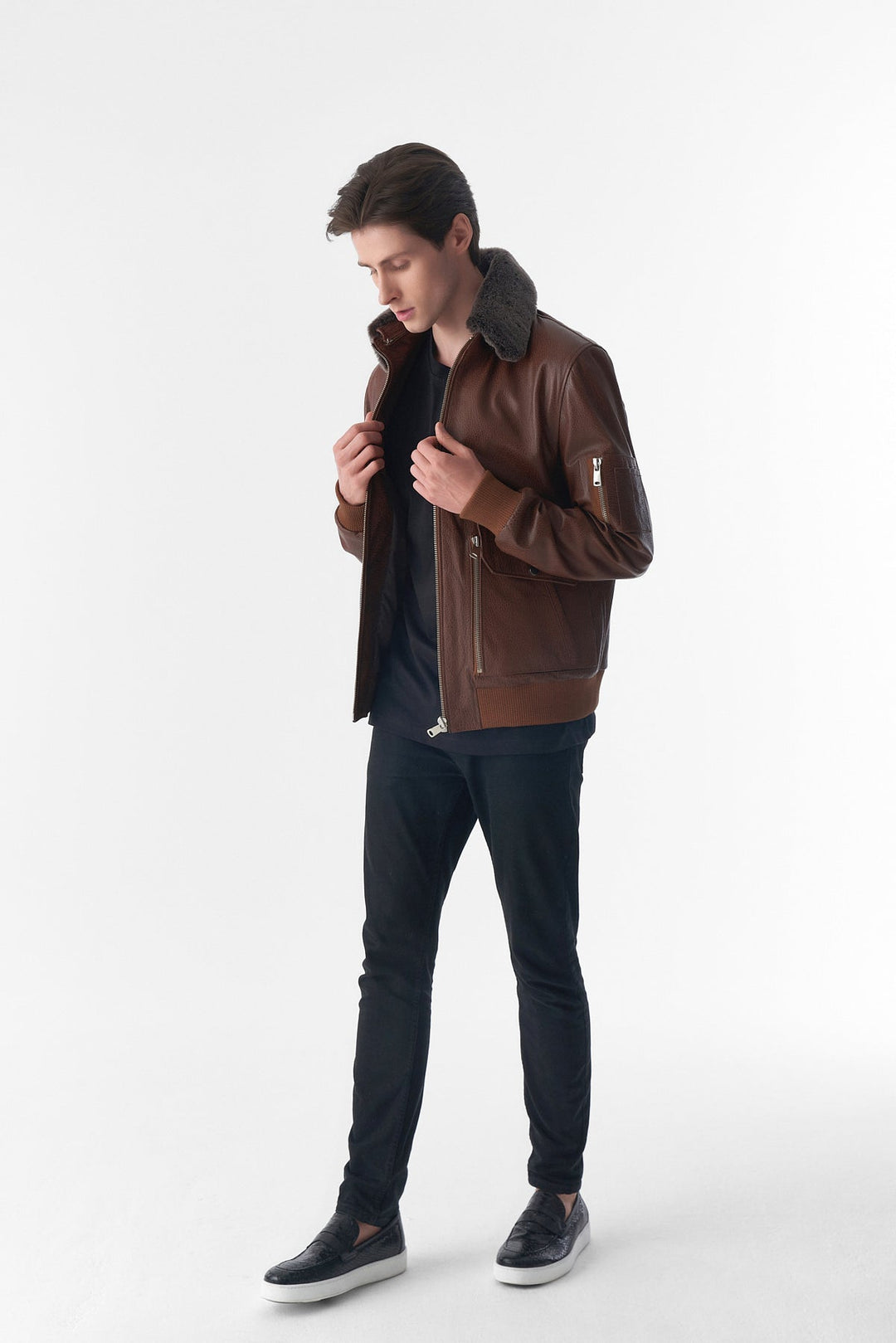 Man wearing brown leather jacket