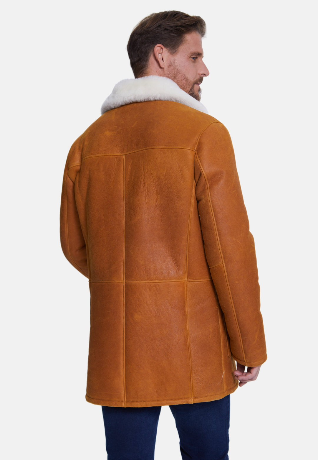 Man wearing brown sheepskin coat