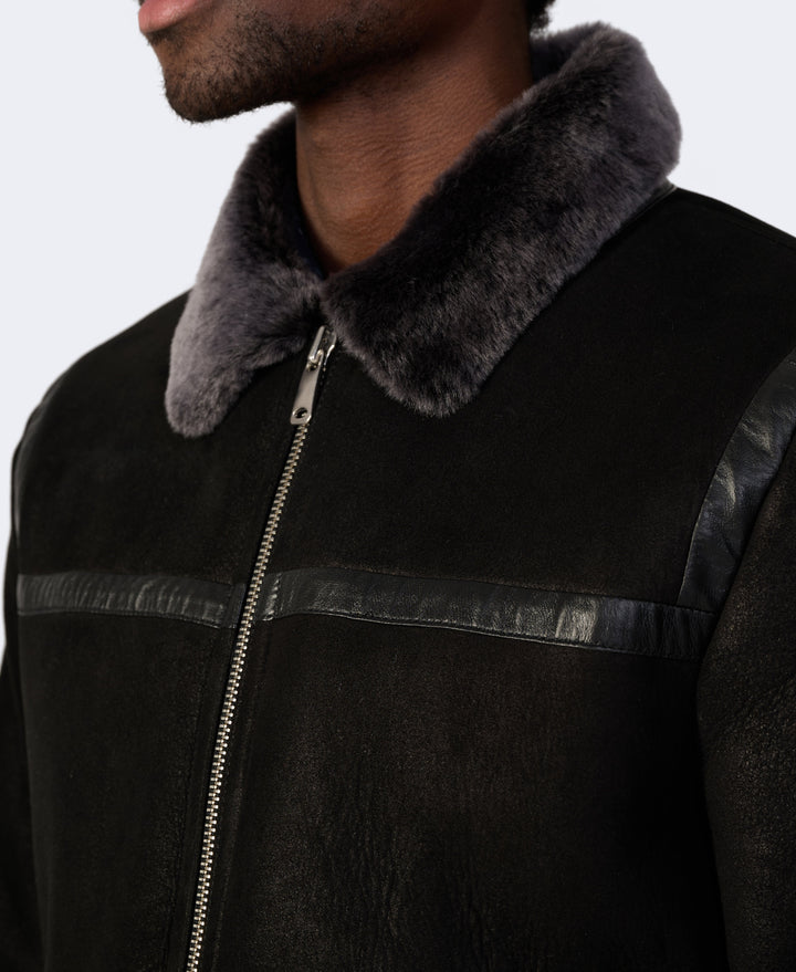 Black shearling jacket with grey fur collar