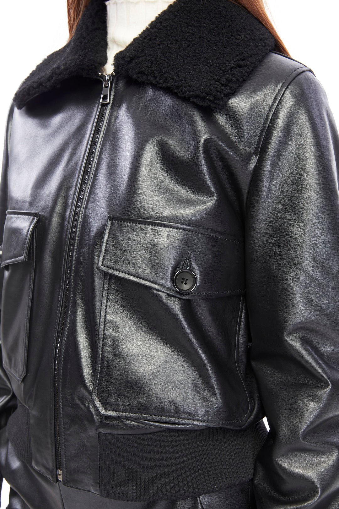 Black leather bomber jacket with shearling collar