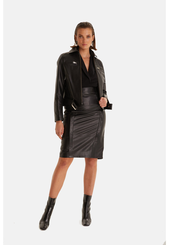 Woman wearing black leather jacket outfit