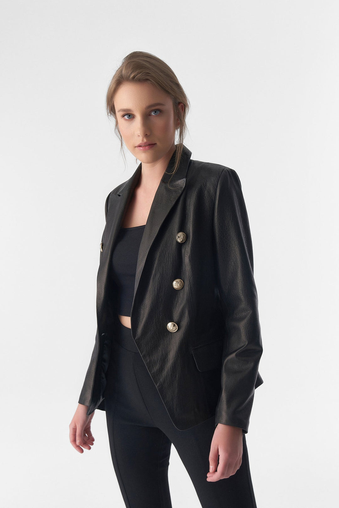 Woman wearing black leather blazer