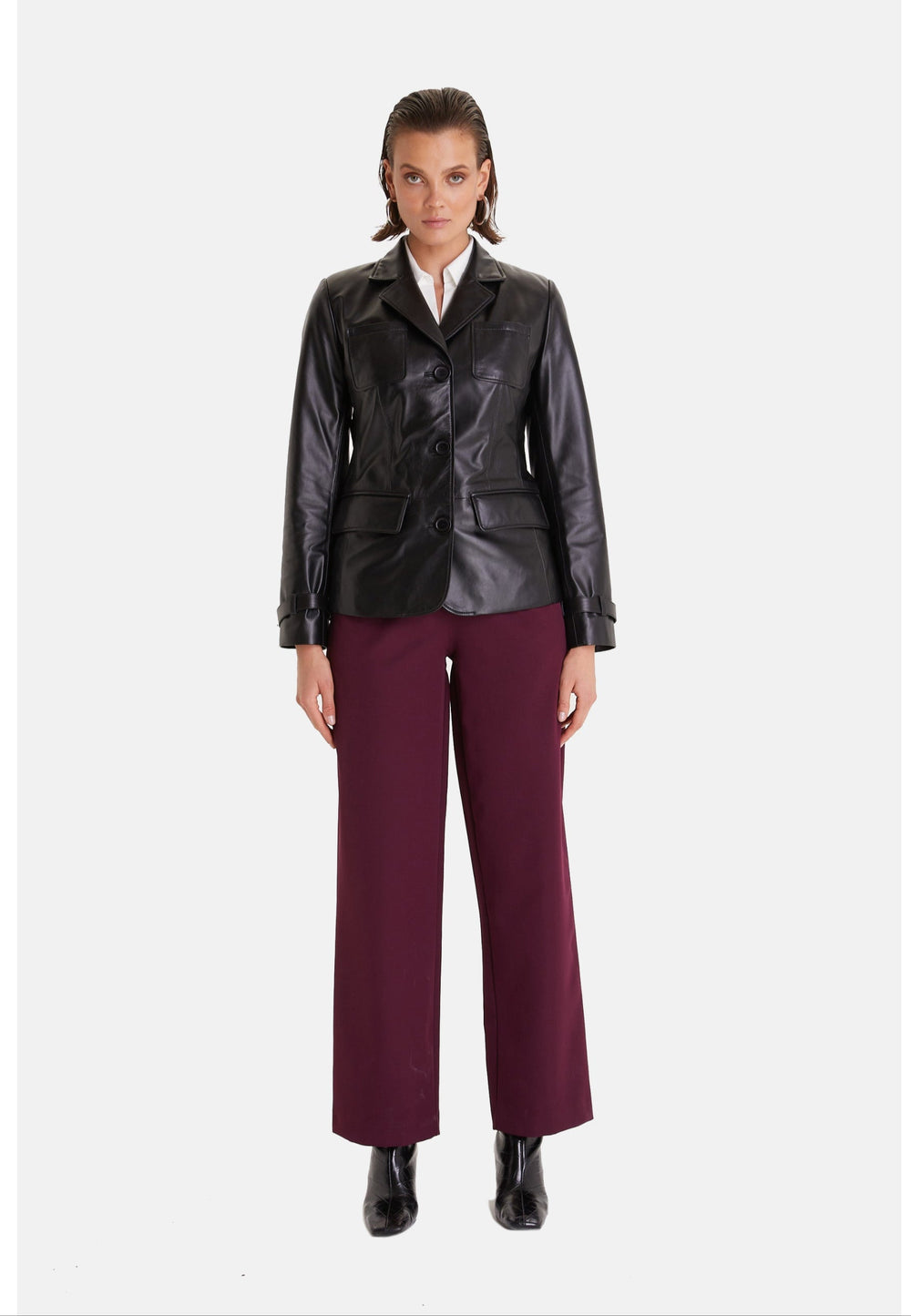 Woman wearing black leather jacket