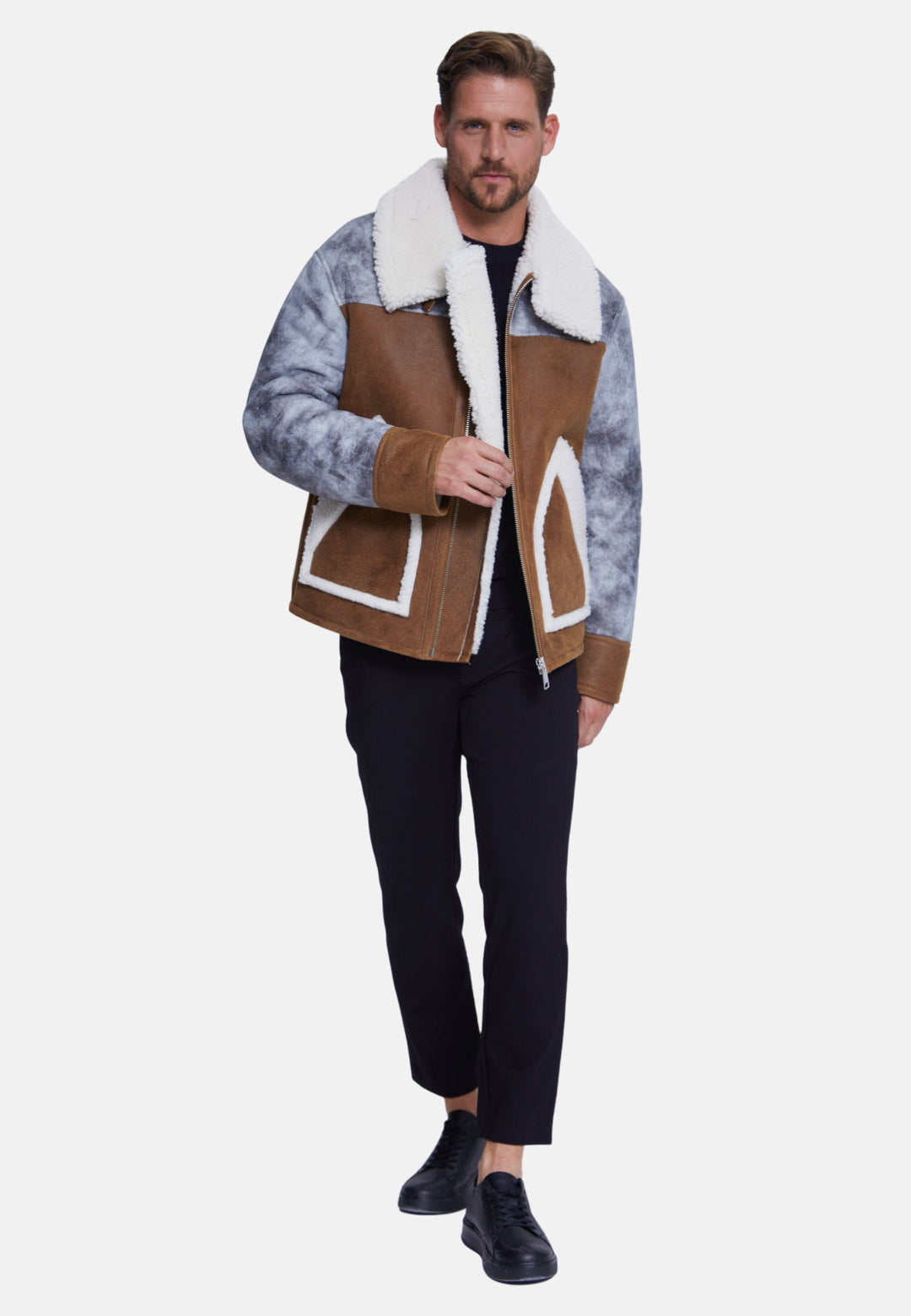 Man wearing brown shearling coat