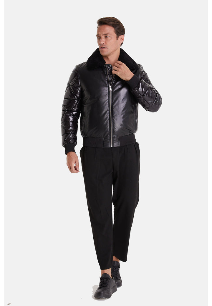 Man wearing black leather bomber jacket