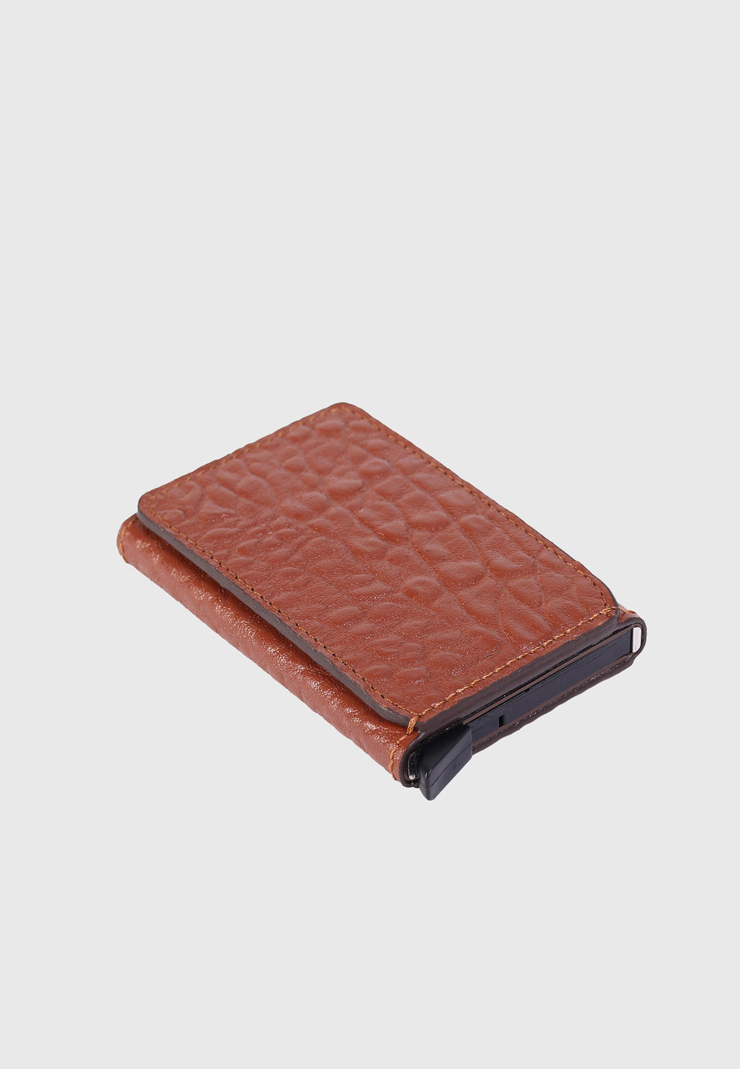Tan leather elephant-pattern card holder