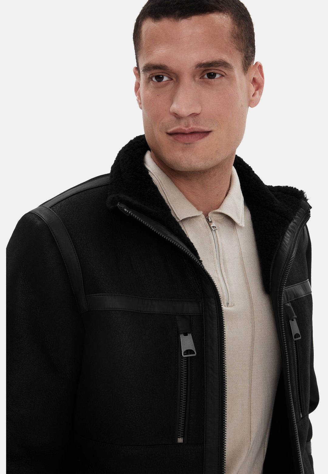 Man wearing black sheepskin coat