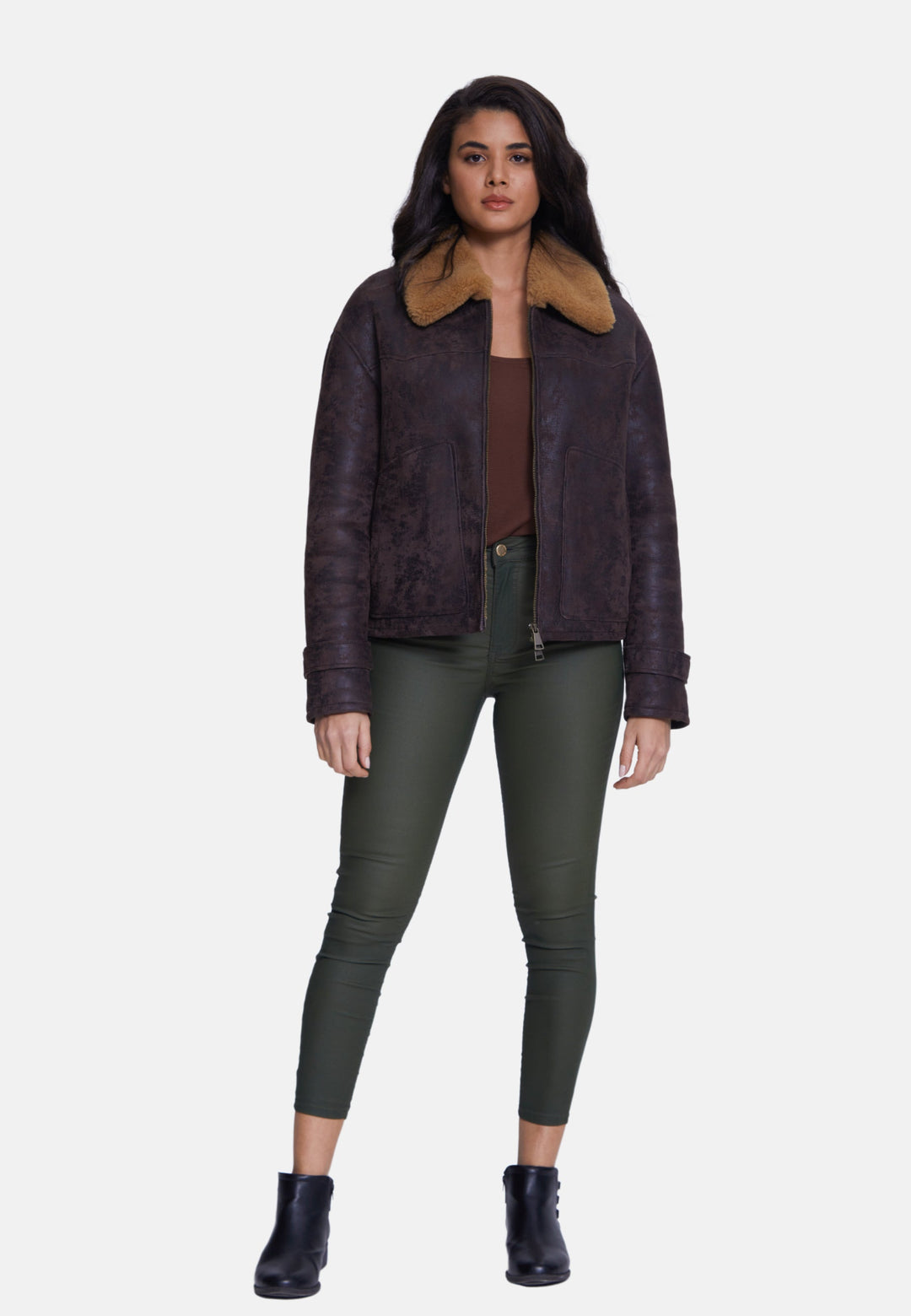Woman wearing brown sheepskin jacket