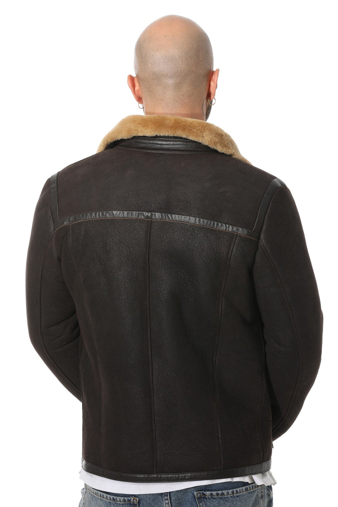 Bald man wearing brown shearling jacket back